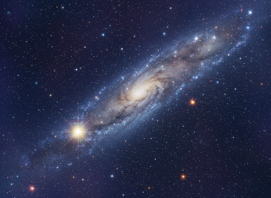 Educational documentary shot of a diverse field of stars, some appearing brighter and larger than others, within a section of the Milky Way galaxy, emphasizing the sheer number and variety of stars.